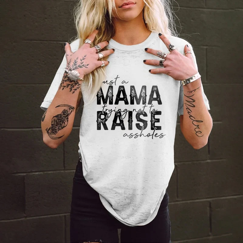 JUST A MANA TRYING NOT TO RAISE ASSHOLES PRINTED WOMEN'S T-SHIRT